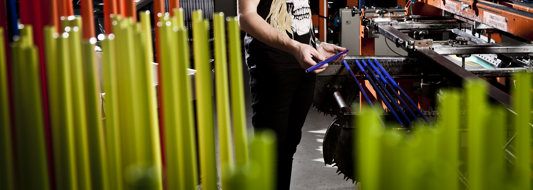 A leki employee working on poles